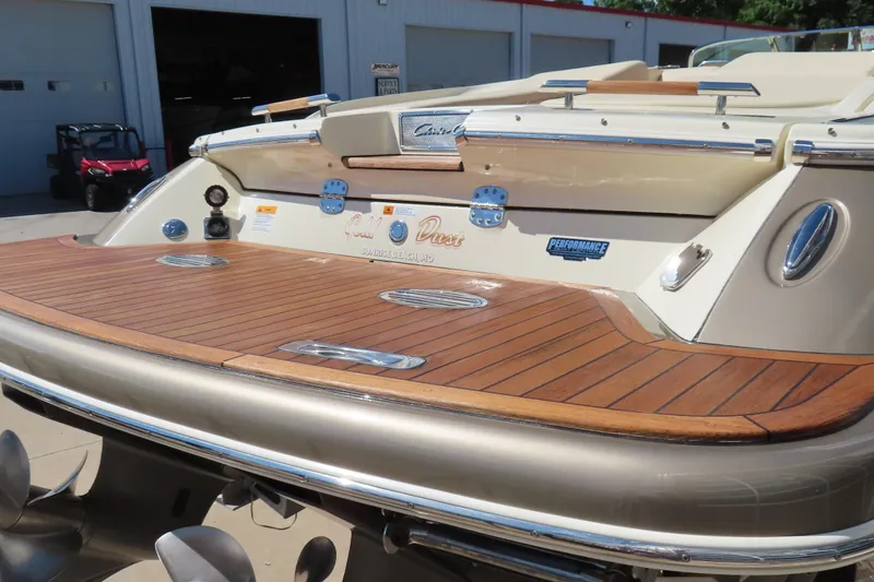 Slide: The Image of 2018 Chris Craft Launch 34 boat with teak swim platform and chrome details. - 7