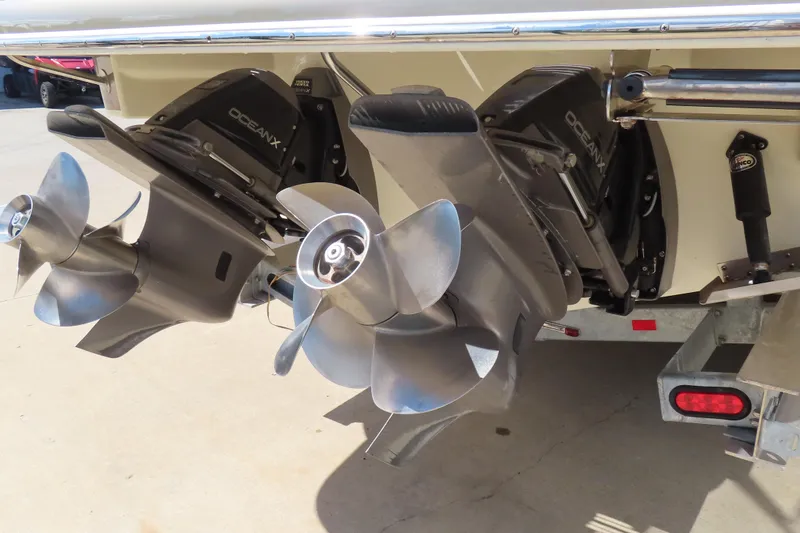 Slide: The Image of 2018 Chris Craft Launch 34 boat with dual Ocean X outdrives and propellers. - 8