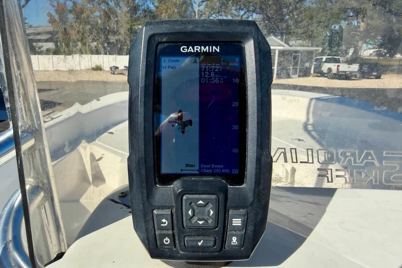 Slide: The Image of Garmin fishfinder on 2010 Carolina Skiff 192 DLV boat dashboard. - 15