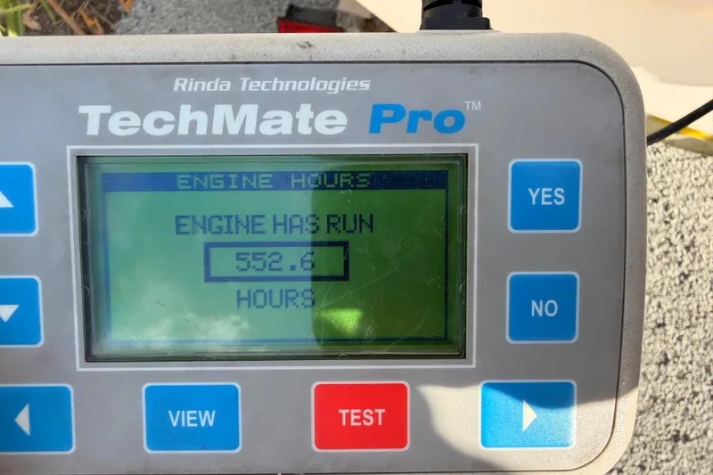 Slide: The Image of TechMate Pro engine hour meter showing 552.6 hours for 2010 Carolina Skiff 192 DLV. - 29