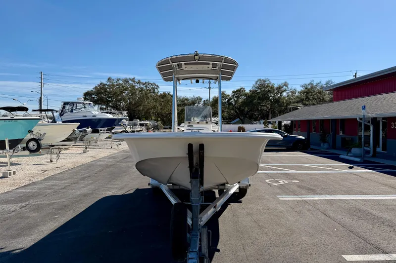 Slide: The Image of 2010 Carolina Skiff 192 DLV boat on trailer in parking lot. - 3