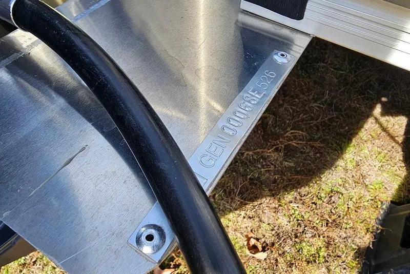 Slide: The Image of Close-up of SunCatcher Select 22RF 2026 model identification plate on metal surface. - 23