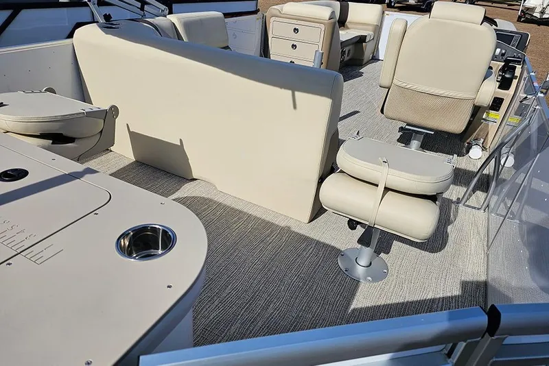 Slide: The Image of 2026 SunCatcher Select 22RF boat interior with beige seating and modern design. - 7