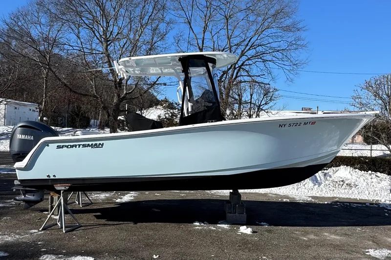 Slide: The Image of 2023 Sportsman Open 232 Center Console boat on display, featuring Yamaha engine. - 4