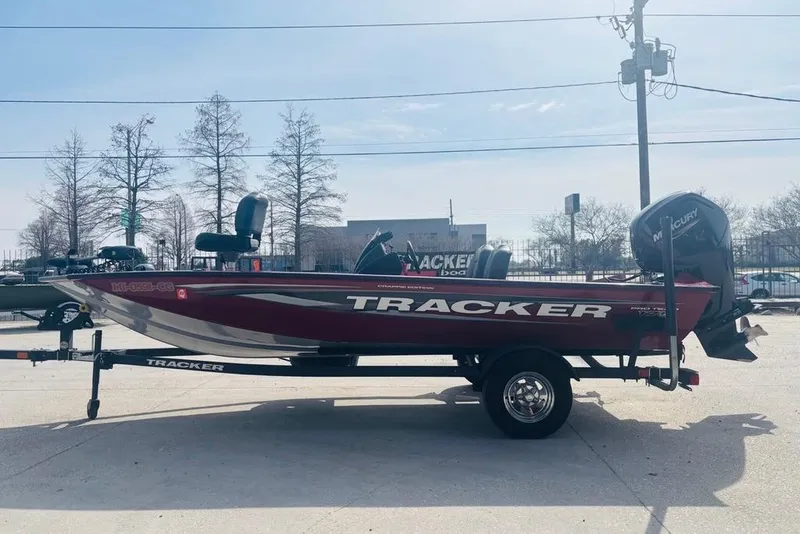 Slide: The Image of 2025 Tracker Pro Team 175 Crappie Edition boat on trailer, side view. - 10