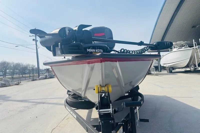 Slide: The Image of 2025 Tracker Pro Team 175 Crappie Edition boat with Minn Kota motor on trailer. - 12