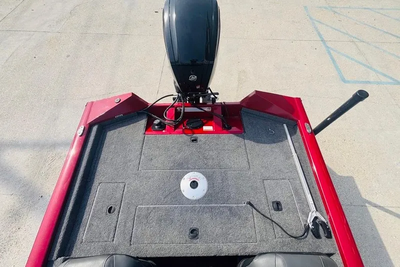 Slide: The Image of 2025 Tracker Pro Team 175 Crappie Edition boat, rear view with motor and deck. - 16