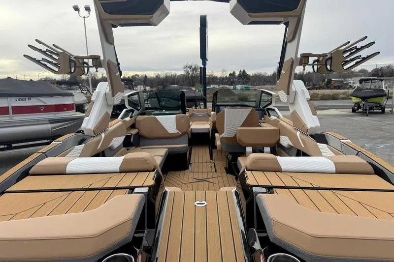 Slide: The Image of 2026 MasterCraft X24 boat interior with luxurious seating and modern design. - 4