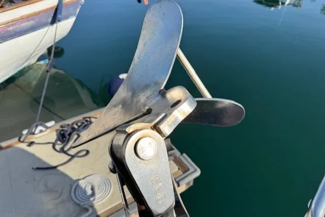 Slide: The Image of Close-up of a 1986 Fairweather Mariner 39 boat propeller at a dock. - 26