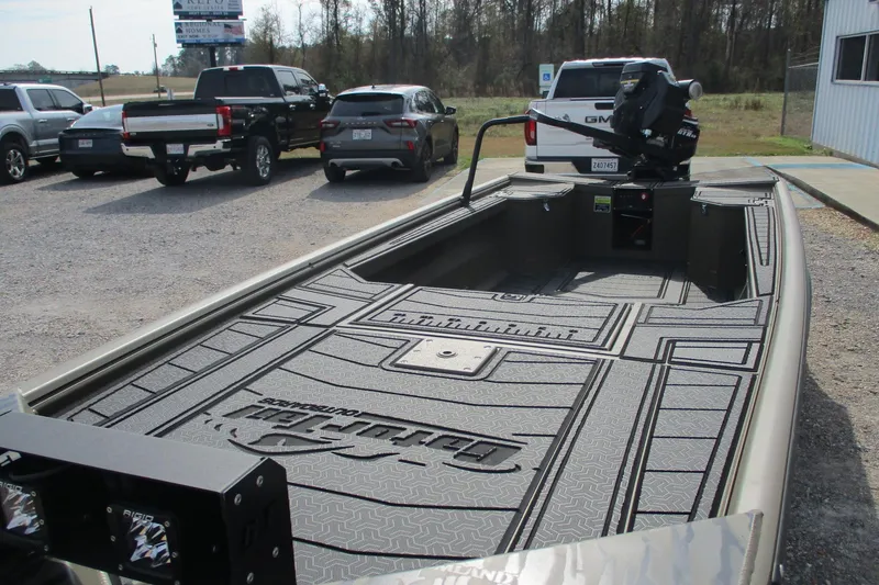 Slide: The Image of 2026 Gator Tail 1854 Extreme boat in parking lot, showcasing spacious interior design. - 4