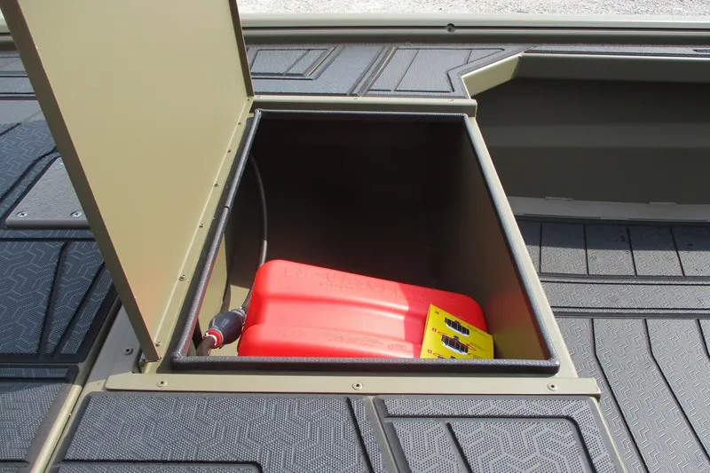 Slide: The Image of Open storage compartment in 2026 Gator Tail 1854 Extreme boat with red fuel container. - 8