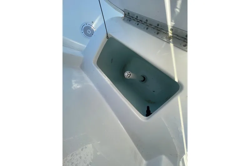 Slide: The Image of 2019 Sea Hunt BX 22 BR boat interior with livewell feature. - 12