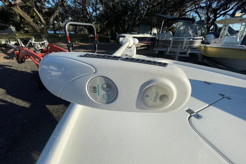 Slide: The Image of 2019 Sea Hunt BX 22 BR boat with i-Pilot trolling motor, parked outdoors. - 16