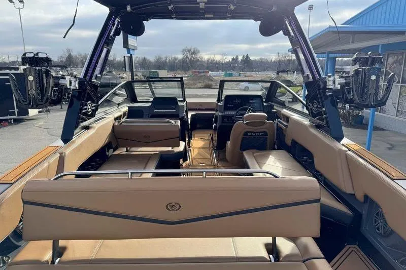 Slide: The Image of 2026 Cobalt R8 Surf boat interior with luxurious seating and modern dashboard. - 7