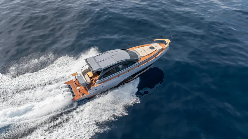 Slide: The Image of 2025 Hanover 415 yacht cruising on open sea, aerial view. - 17