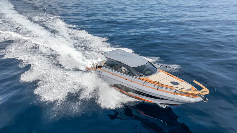 Slide: The Image of Hanover 415 yacht cruising on open water, 2025 model. - 25