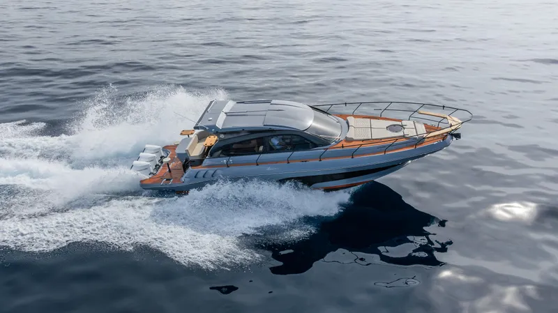 Slide: The Image of 2025 Hanover 415 yacht cruising on open water. - 30