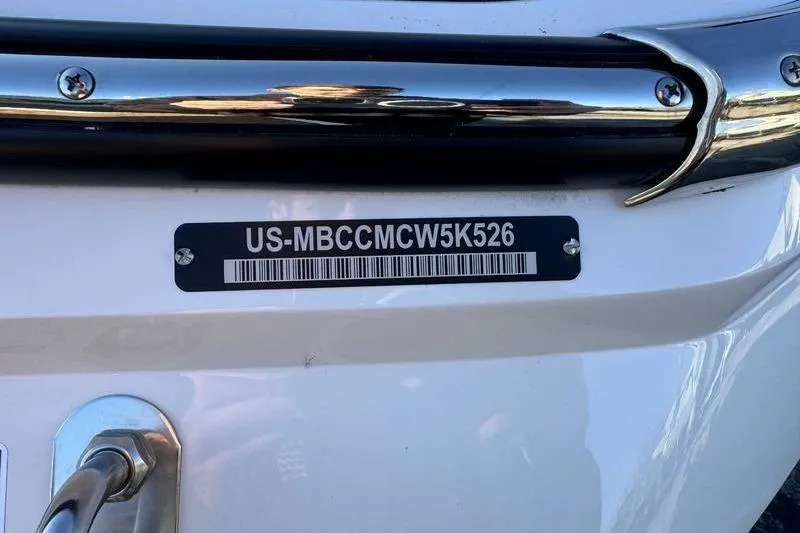 Slide: The Image of 2026 MasterCraft NXT20 boat with visible hull identification number. - 13