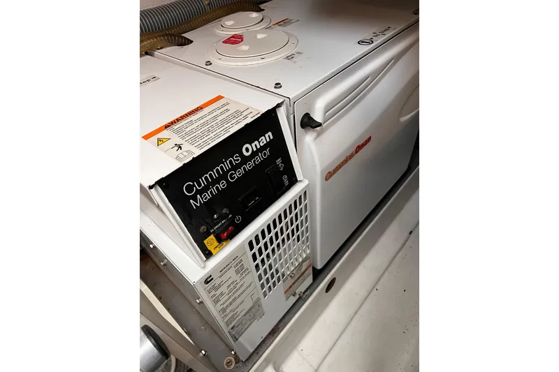 Slide: The Image of 2010 Beneteau Monte Carlo 47 yacht deck with city skyline in background. - 23