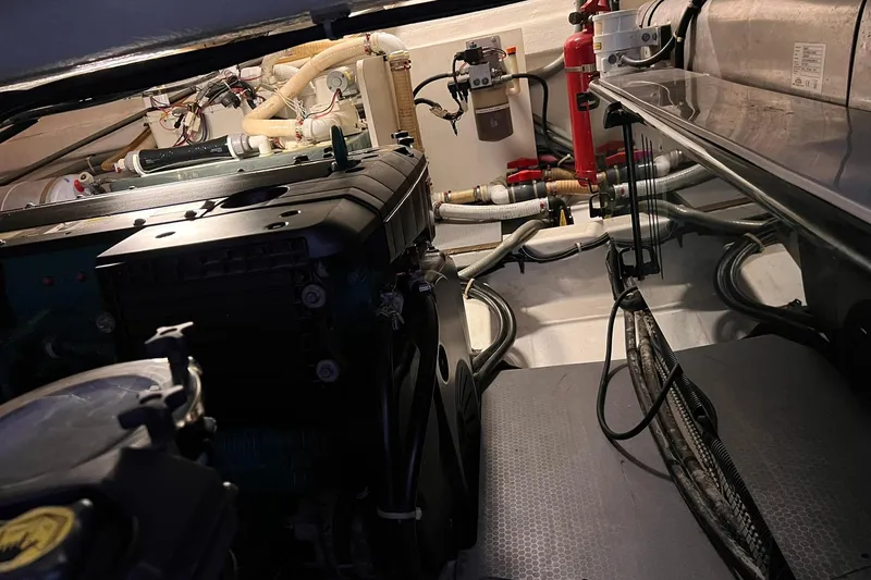 Slide: The Image of Jet ski on Beneteau Monte Carlo 47 yacht deck, 2010 model, with scenic waterfront view. - 27