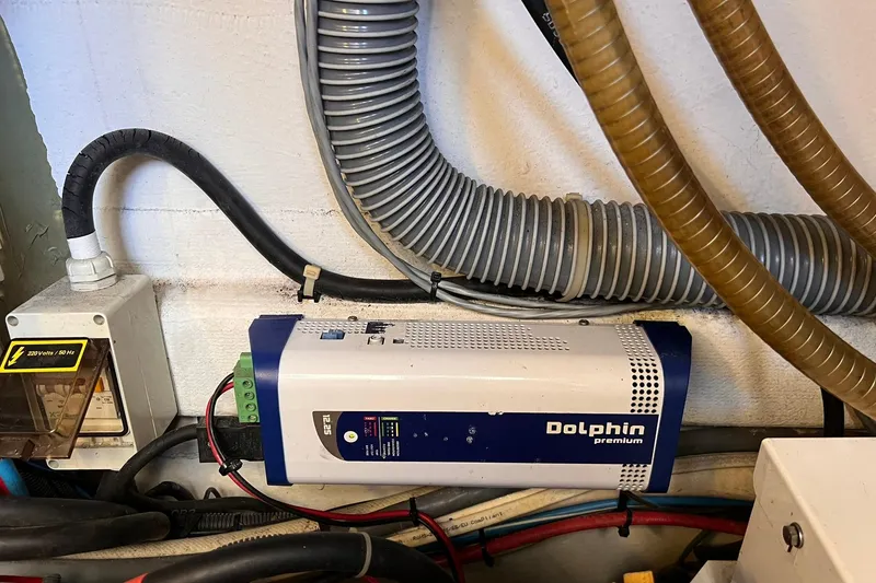 Slide: The Image of 2010 Beneteau Monte Carlo 47 yacht with jet ski on water, sunny day. - 28