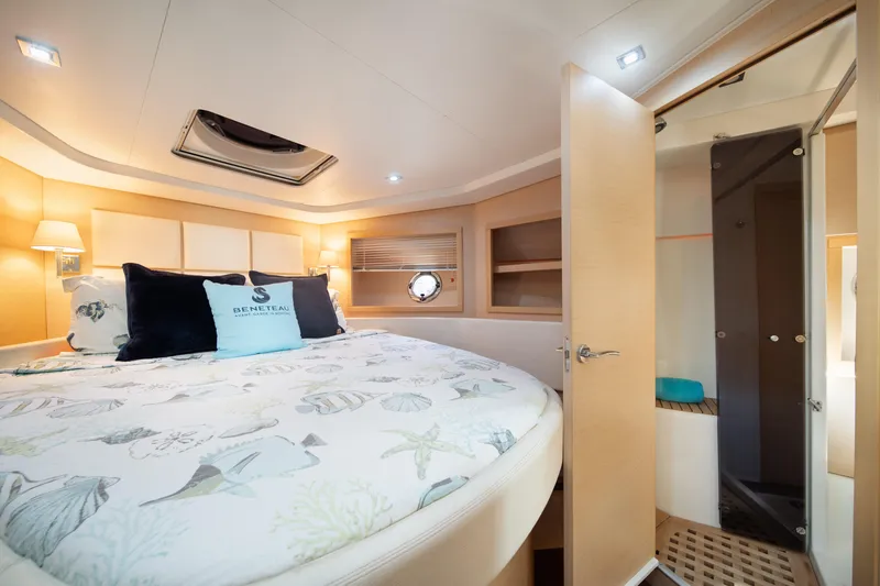 Slide: The Image of Luxurious cabin interior of 2010 Beneteau Monte Carlo 47 yacht with ensuite bathroom. - 30