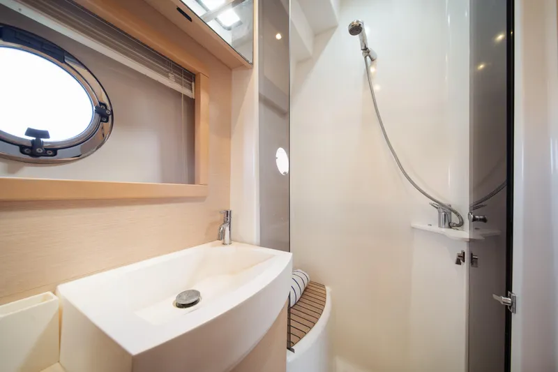 Slide: The Image of Bathroom interior of 2010 Beneteau Monte Carlo 47 yacht, featuring modern sink and shower. - 36