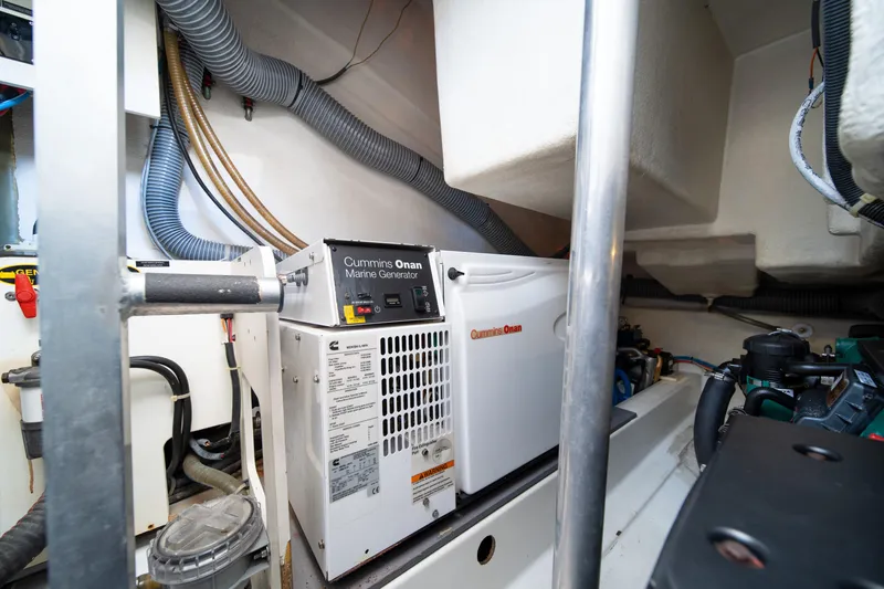 Slide: The Image of Engine room of 2010 Beneteau Monte Carlo 47 with Cummins Onan marine generator. - 42