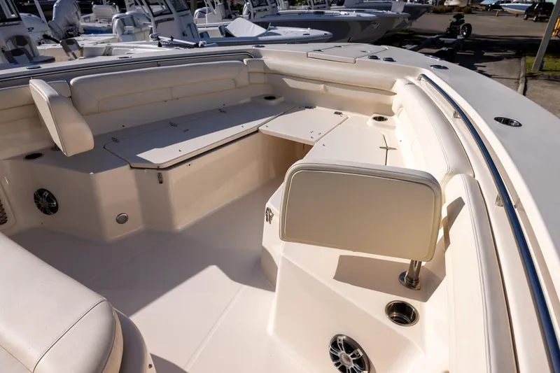 Slide: The Image of 2022 Grady-White Canyon 376 boat interior with spacious seating and modern design. - 16