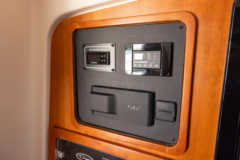 Slide: The Image of Control panel on 2022 Grady-White Canyon 376 boat with Dometic and Garmin systems. - 20