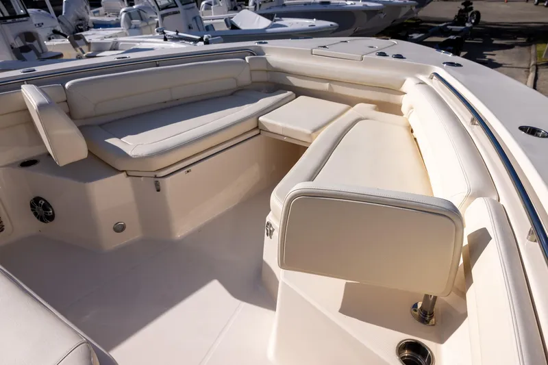 Slide: The Image of 2022 Grady-White Canyon 376 boat interior with luxurious seating arrangement. - 22