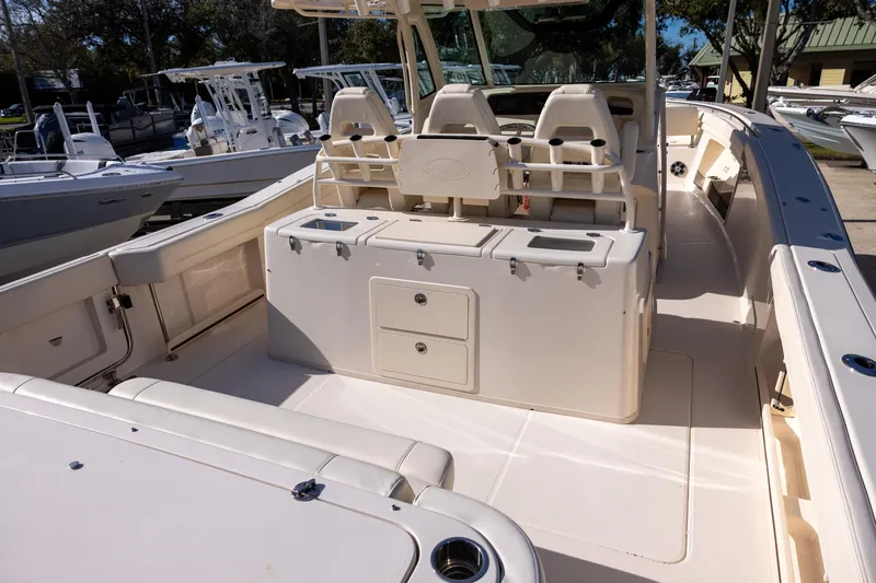 Slide: The Image of 2022 Grady-White Canyon 376 boat interior with seating and storage compartments. - 4