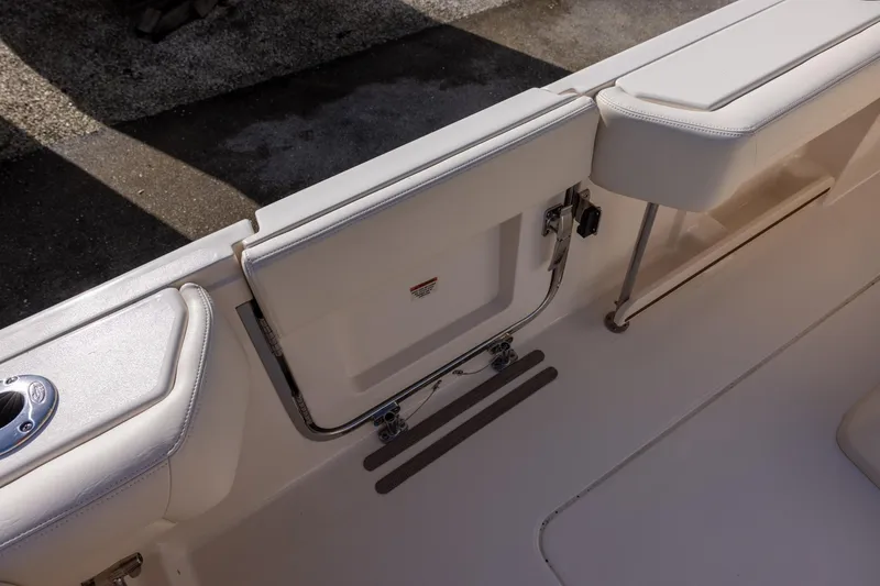 Slide: The Image of 2022 Grady-White Canyon 376 boat interior with seating and storage features. - 9