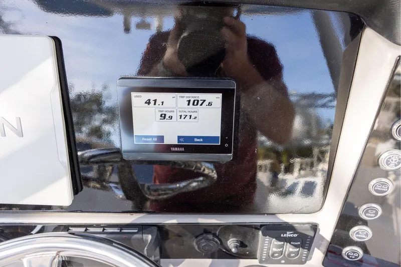 Slide: The Image of Dashboard of 2022 Robalo R242 Explorer showing trip data on Yamaha display. - 12