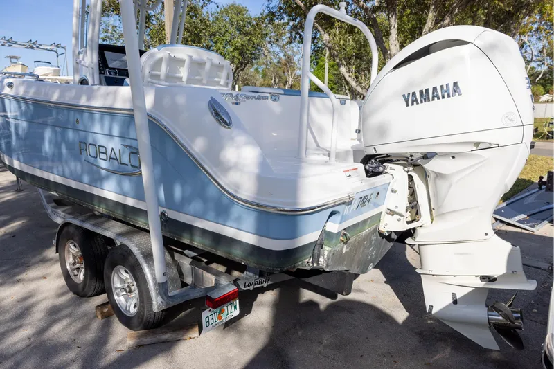 Slide: The Image of 2022 Robalo R242 Explorer boat with Yamaha engine on trailer. - 4