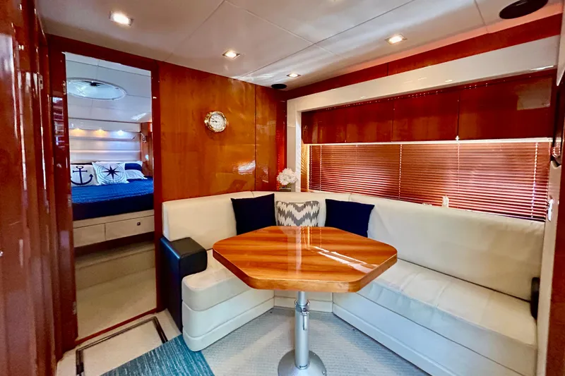 Slide: The Image of Luxurious interior of 2010 Sunseeker Predator 64 yacht with elegant seating and wooden accents. - 15