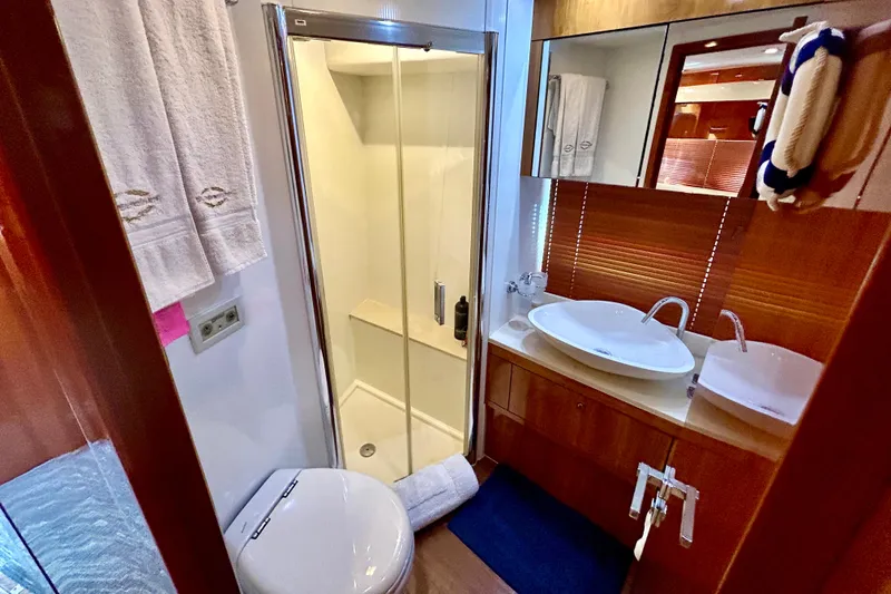 Slide: The Image of Luxurious bathroom in 2010 Sunseeker Predator 64 yacht with shower and modern sink. - 22