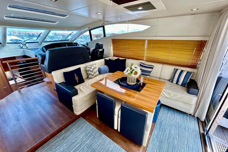 Slide: The Image of Luxurious interior of 2010 Sunseeker Predator 64 yacht with elegant seating and decor. - 4