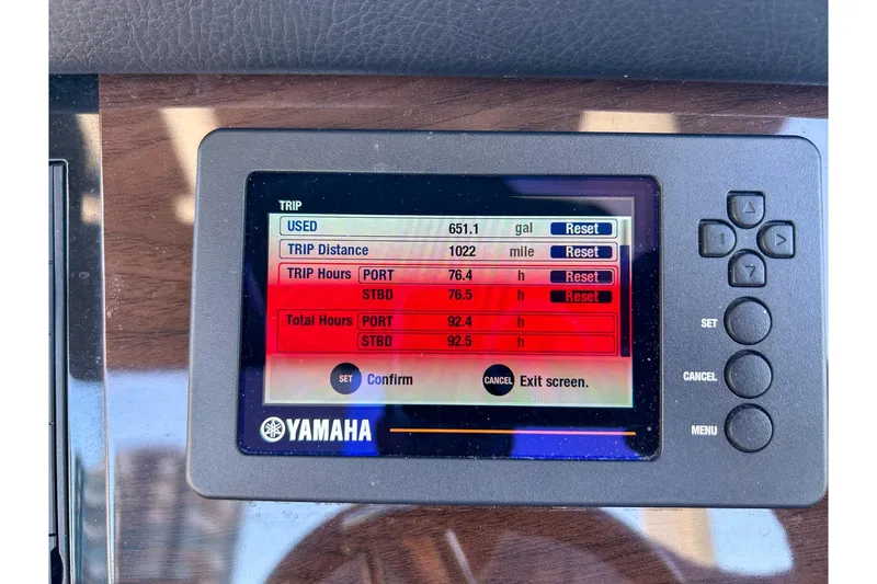 Slide: The Image of Yamaha display on 2021 Chaparral 280 OSX showing trip data and settings. - 9