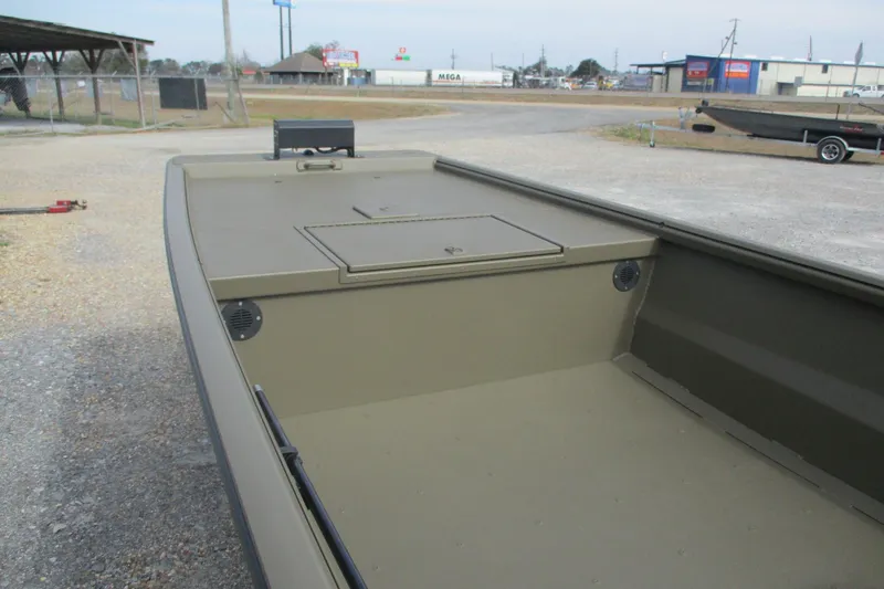 Slide: The Image of 2026 Gator Tail 1748 GATOR boat, olive green, parked on gravel lot. - 5