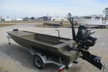 Slide: The Image of 2026 Gator Tail 1748 GATOR boat on trailer, outdoor display. - 9