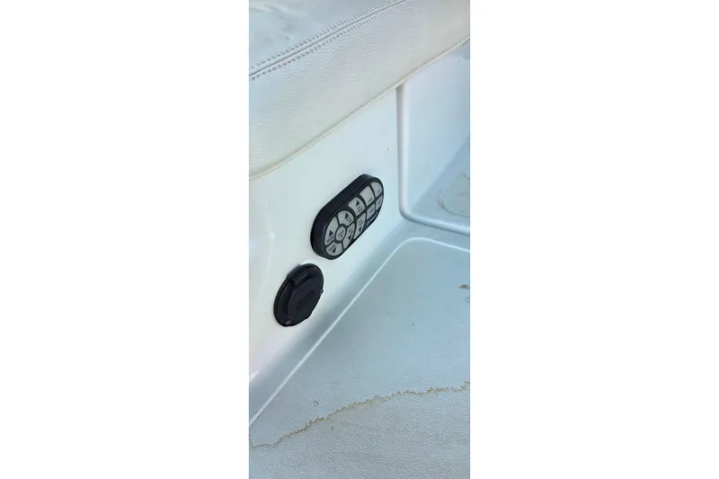 Slide: The Image of Control panel on a 2007 Cobalt 212 boat interior. - 37