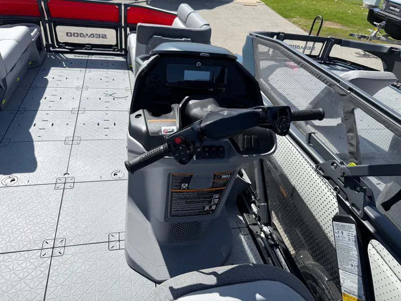 Slide: The Image of Interior of 2025 Sea-Doo Switch Cruise 21 with steering console. - 9