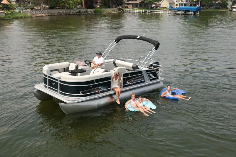 The Image of Starcraft EX 20 Q DH pontoon boat on a serene lake, 2026 model. - 0