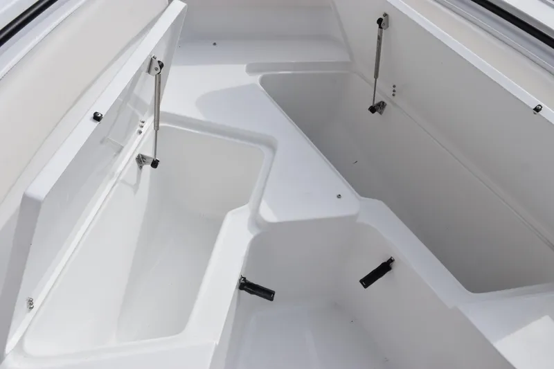 Slide: The Image of 2026 Sea Hunt Ultra 245 SE boat storage compartments, open and spacious design. - 15