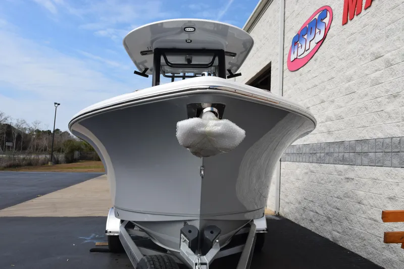 Slide: The Image of 2026 Sea Hunt Ultra 245 SE boat on trailer outside dealership. - 3