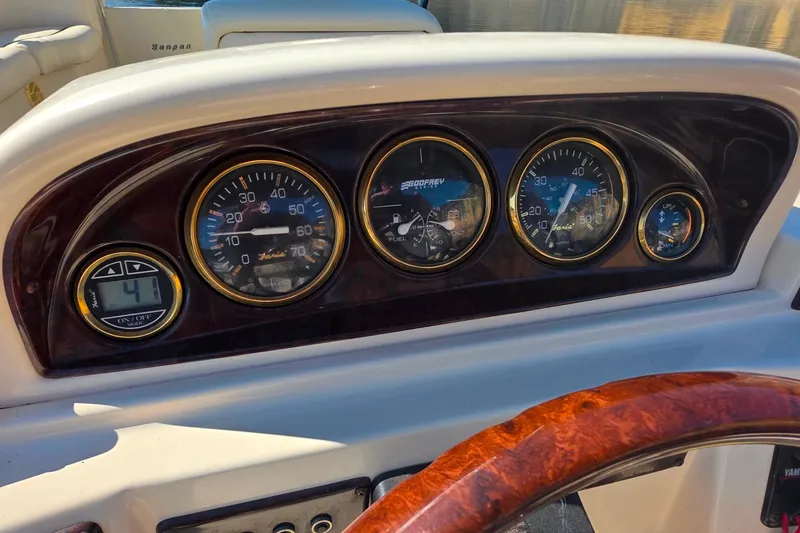 Slide: The Image of Control panel of a 2004 Sanpan 2500 RE boat with Clarion stereo system. - 8