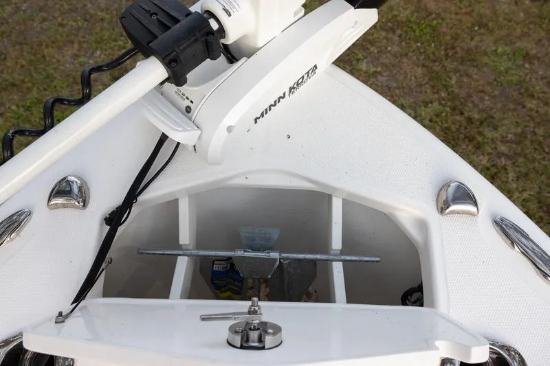 Slide: The Image of 2023 Everglades 243 Center Console boat with Minn Kota trolling motor and anchor storage. - 13