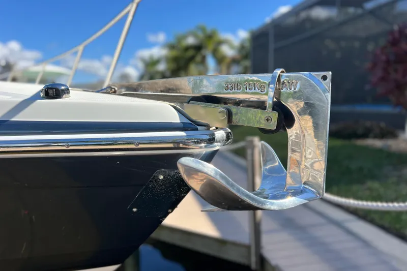 Slide: The Image of Close-up of a 2017 Formula 370 Super Sport boat anchor in a marina setting. - 11