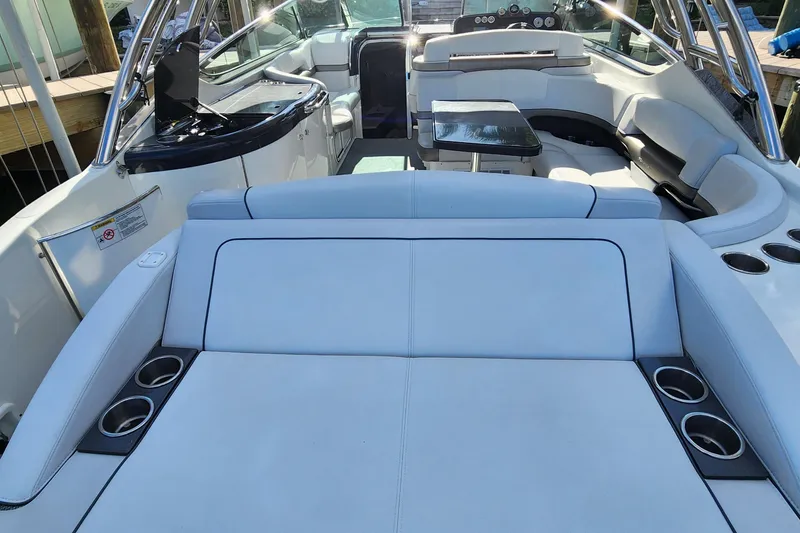 Slide: The Image of 2017 Formula 370 Super Sport boat interior with luxurious seating and sleek design. - 18